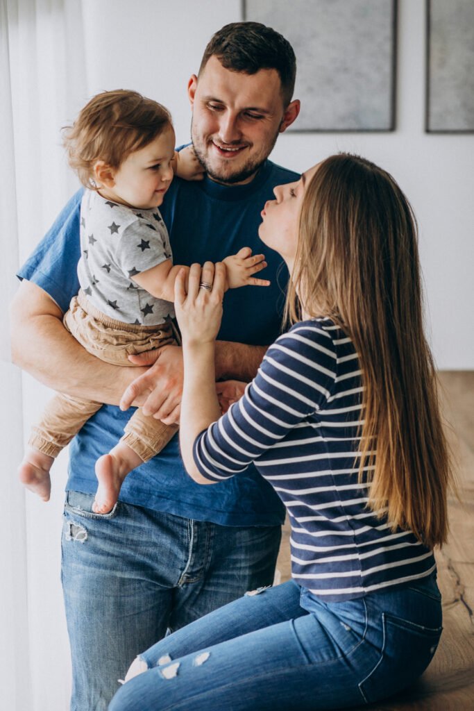 young family with their little son at home